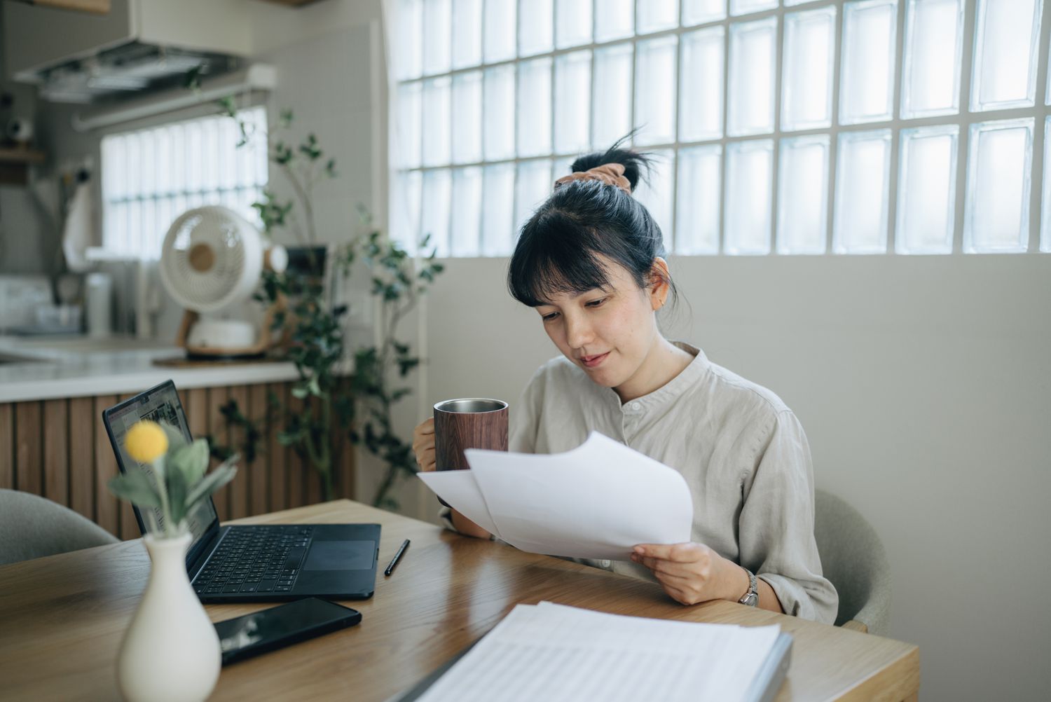 A person evaluating the benefits of personal loan vs. other funding options.