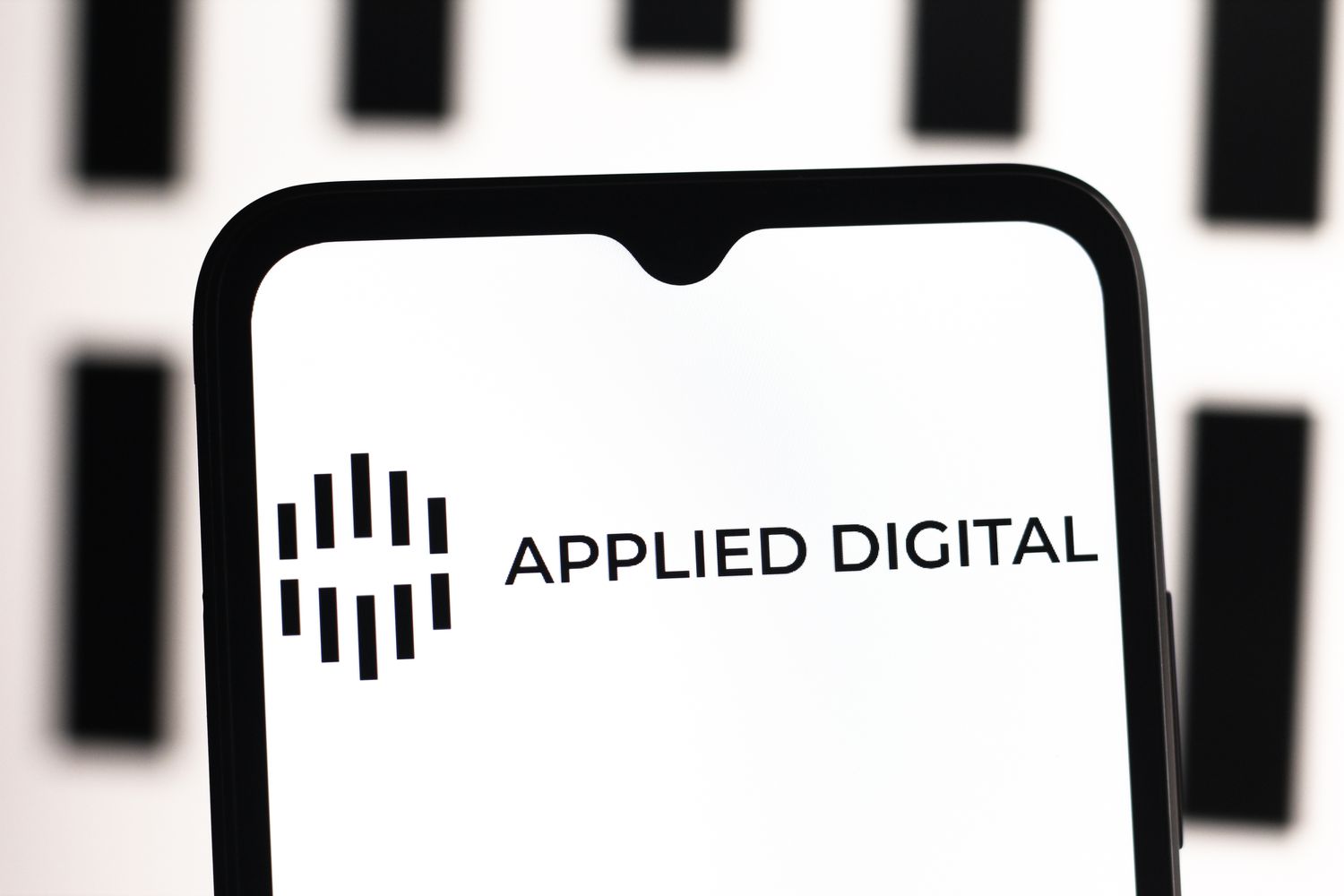 Applied Digital logo displayed on a smartphone screen.
