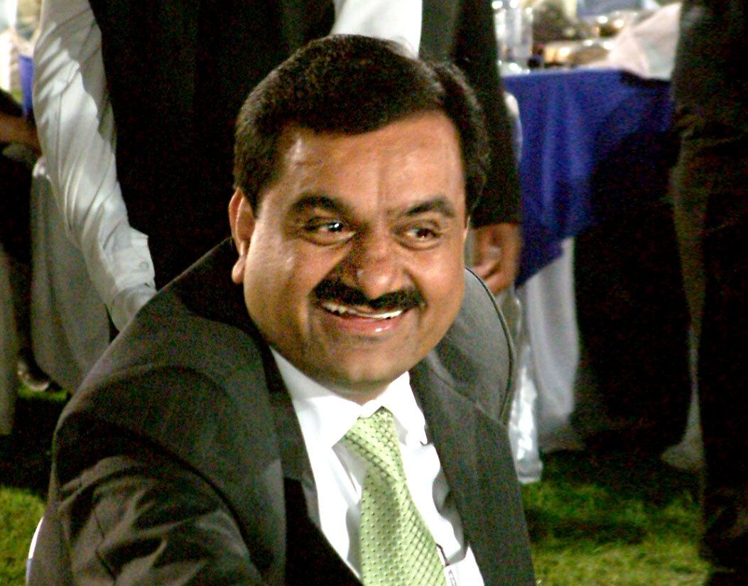Gautam Adani seated at a function.