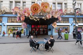 People walk past the Herald Square Macy's in Manhattan, New York