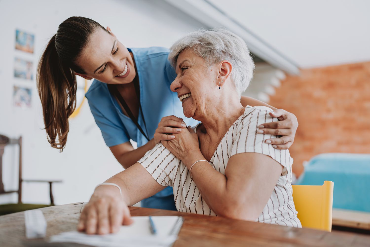 A home health aide with a patient
