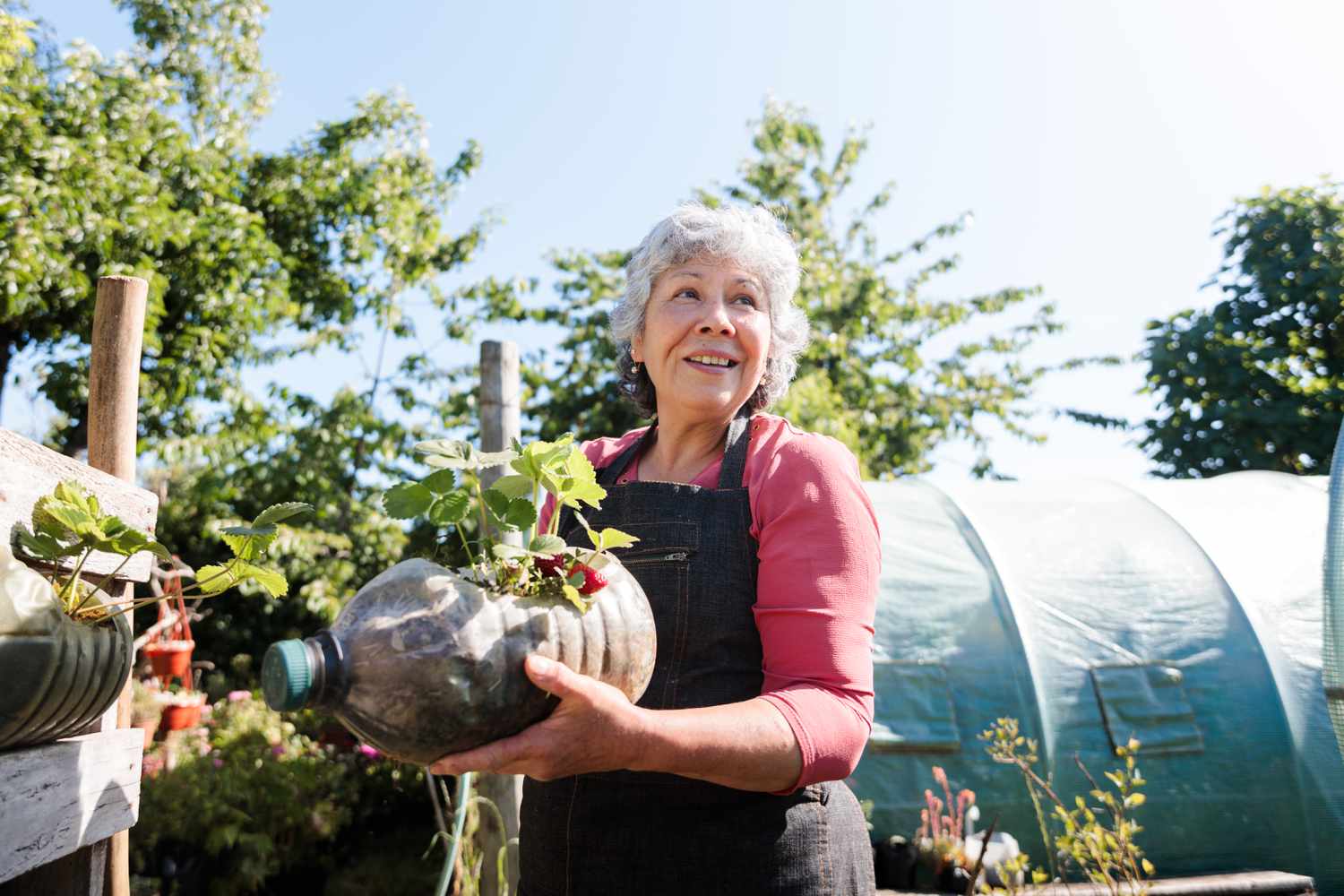Older woman outside in a garden