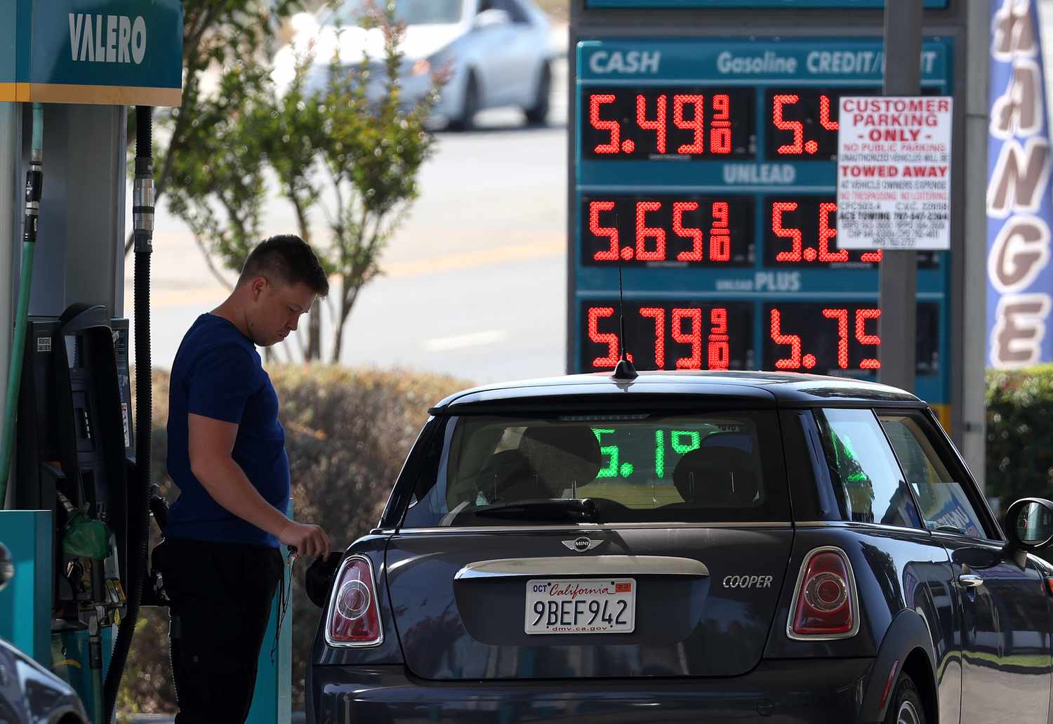  customer pumps gas at a gas station on September 13, 2023 in Petaluma, California. According to a report by the Labor Department, surging gas prices in August contributed to a rise in inflation as consumer spending rose to 3.7 from 3.2 percent in July. 