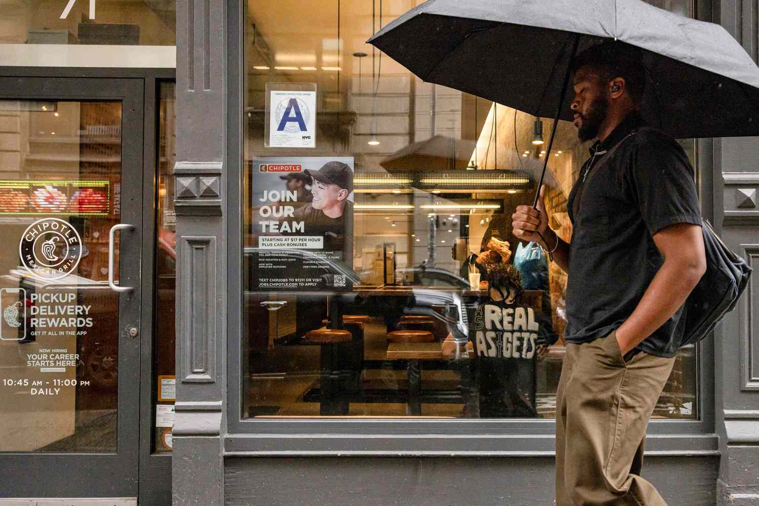 An exterior view of a Chipotle restaurant in New York City in August .