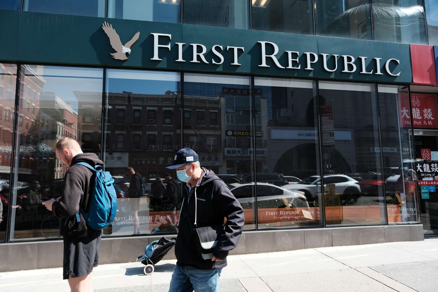A person walks past a First Republic bank branch in Manhattan on April 24, 2023 in New York City.