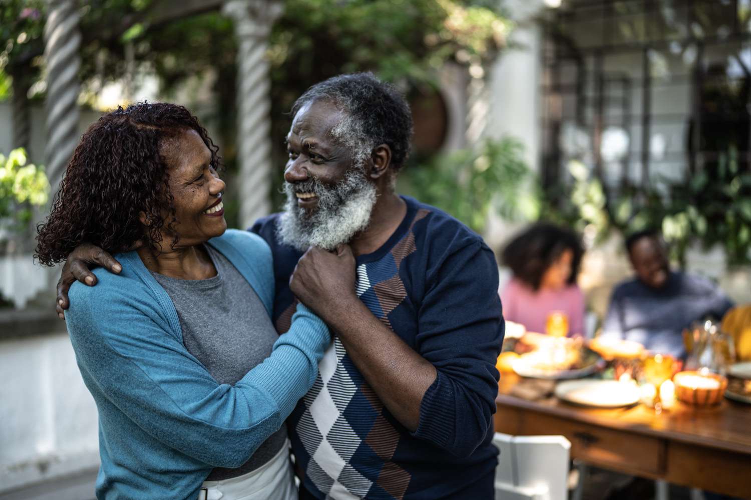 Older couple looking at each other outside