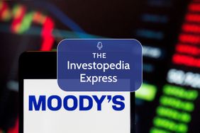 Image of the Moody's logo displayed on a phone screen with a stock chart in the background