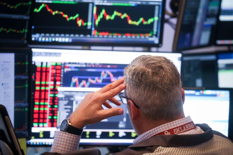 A trader works the floor of the New York Stock Exchange on Thursday. 