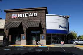 The Rite Aid logo is displayed on the exterior of a Rite Aid pharmacy.