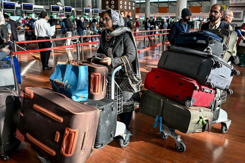 People in airport line