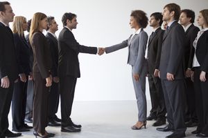 Business leaders shaking hands in agreement.