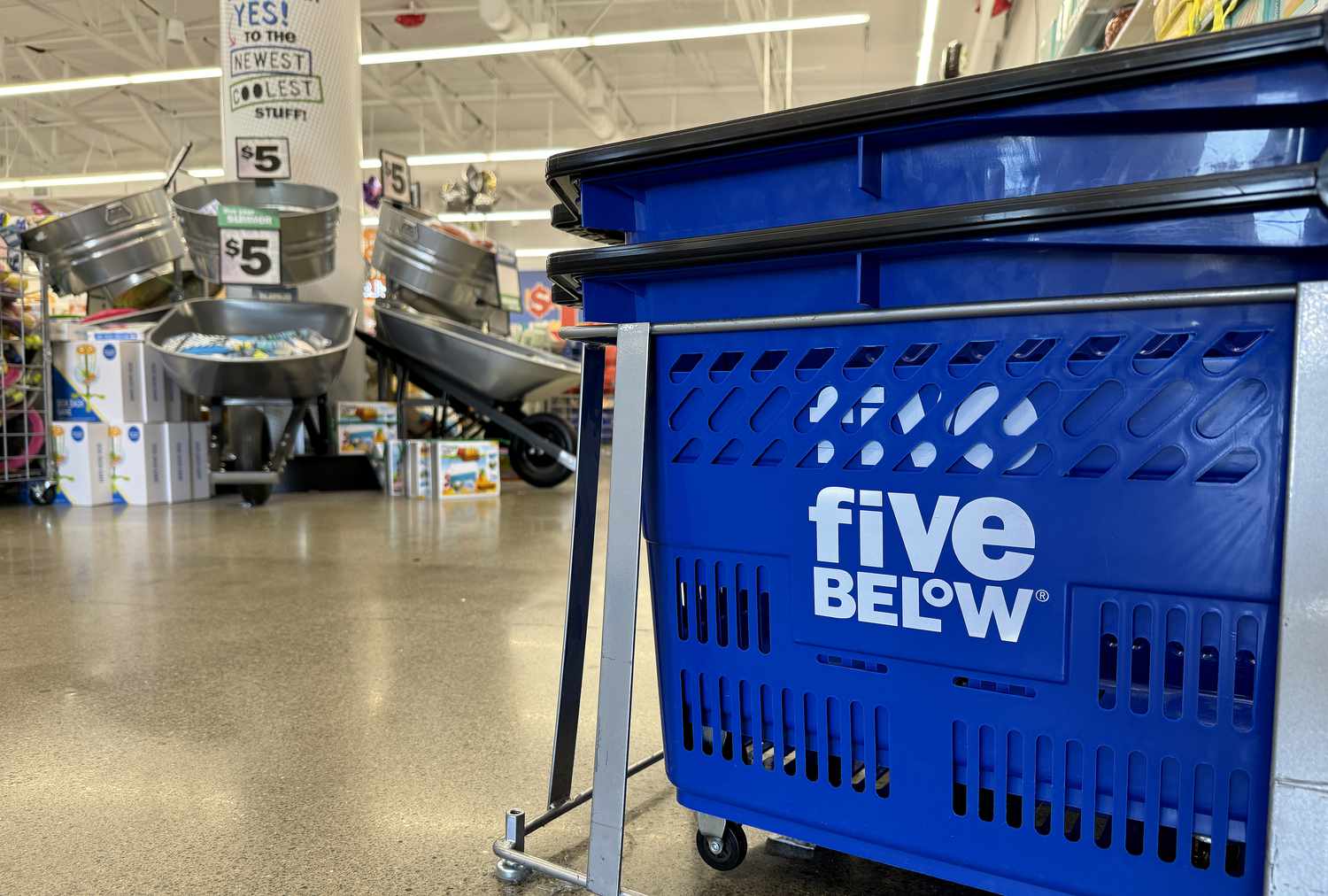 Shopping carts are stacked in a Five Below store. 