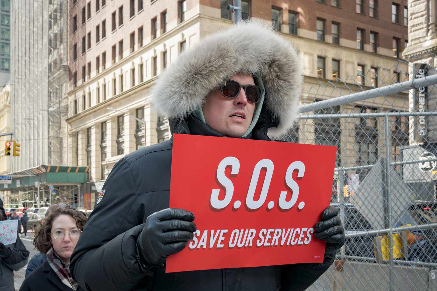 Participant at a protest against the Trump administration's push to cut federal spending, in New York on February 19, 2025.