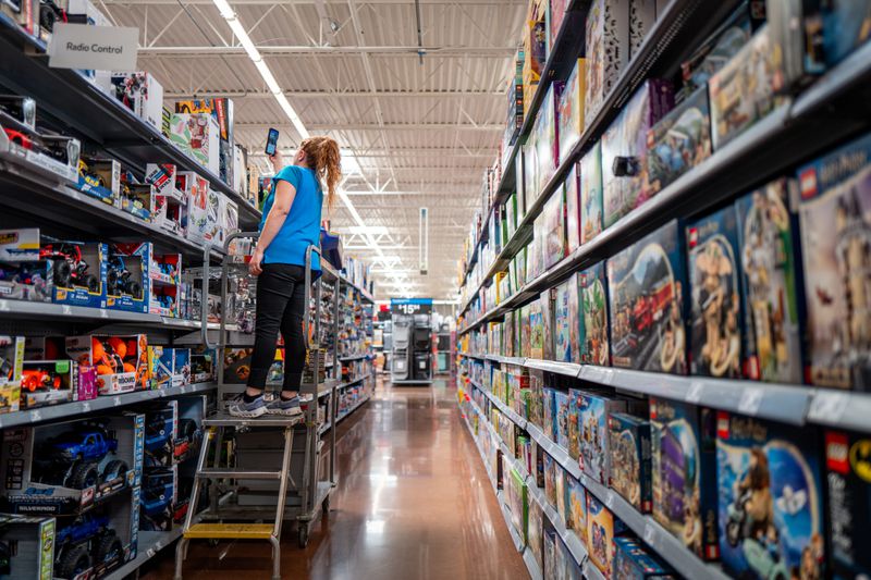 An employee counts inventory in a Walmart Supercenter on May 15, 2025 in Austin, Texas.
