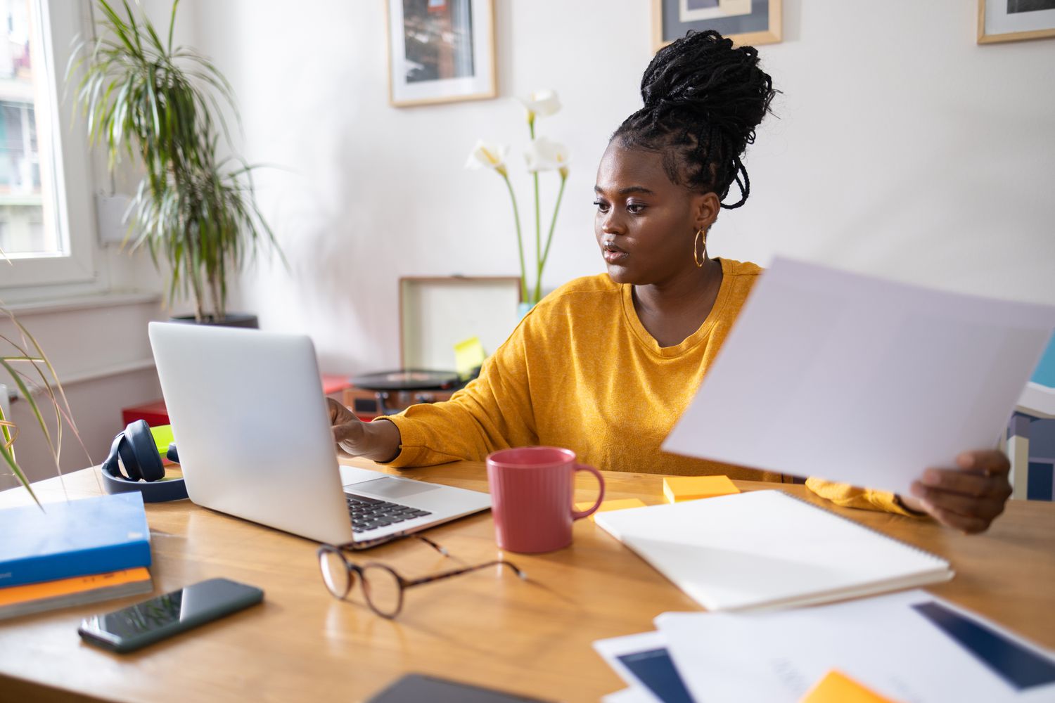 Worker working from home on laptop