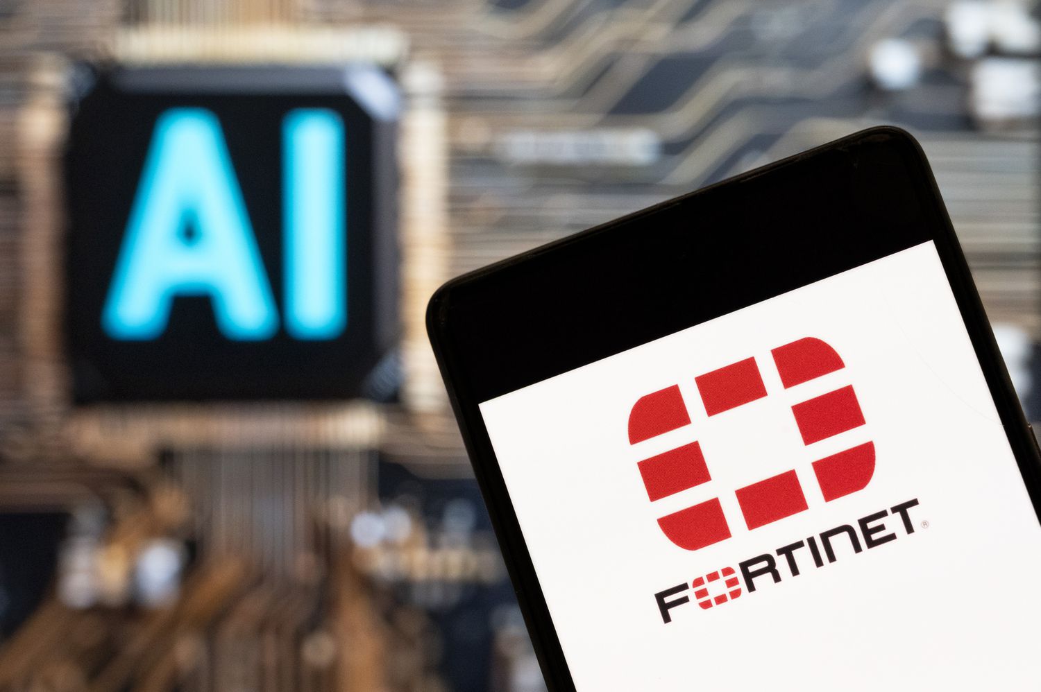 Photo illustration of Fortinet logo on a smartphone. 