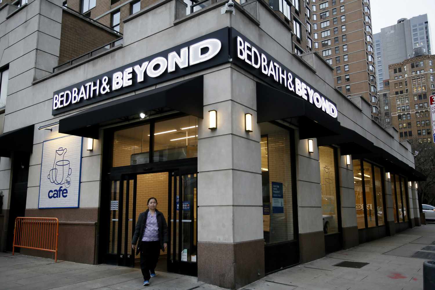 Person exiting Bed Bath & Beyond store