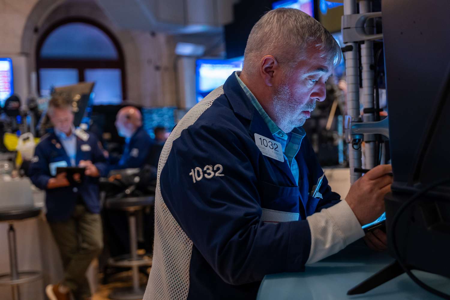 Traders work on the New York Stock Exchange.