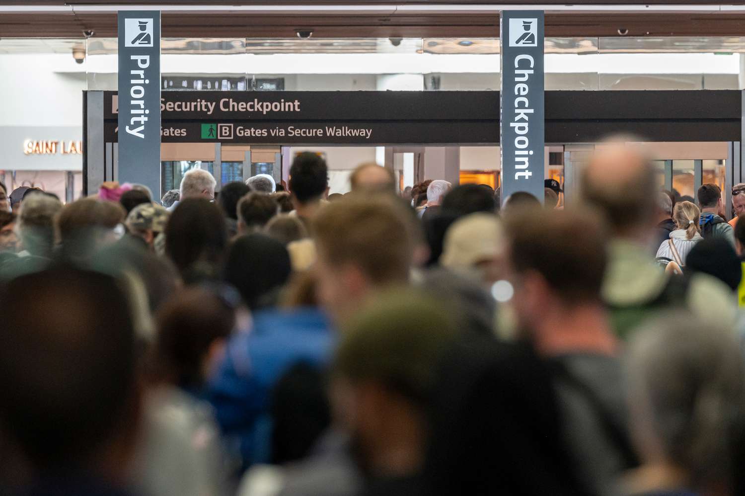 Travelers in a security line at San Francisco International Airport (SFO) in San Francisco, California, on Aug. 29, 2024