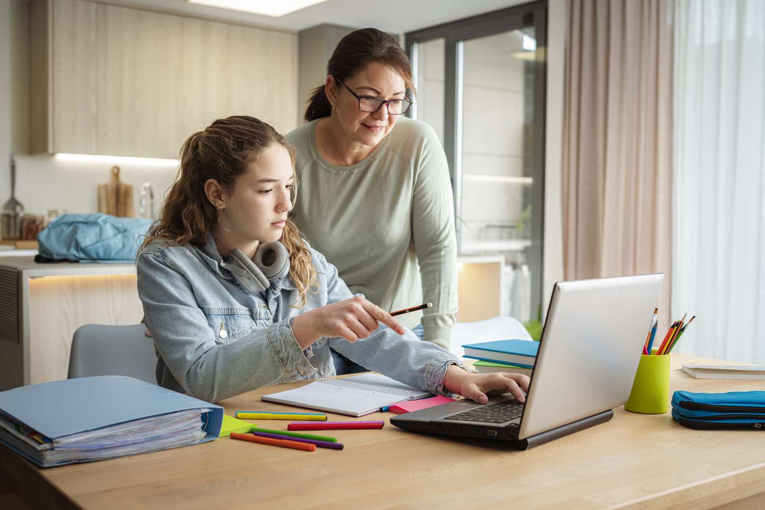 Mother and daughter clearing up their tax confusion regarding college savings accounts 