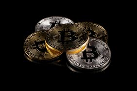 Physical version of Bitcoin coin, aka virtual money.