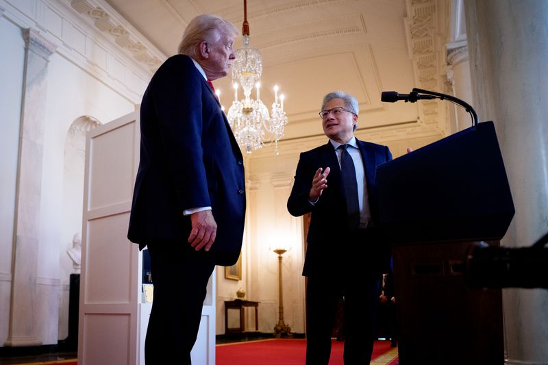 President Donald Trump, left, with Nvidia CEO Jensen Huang. 