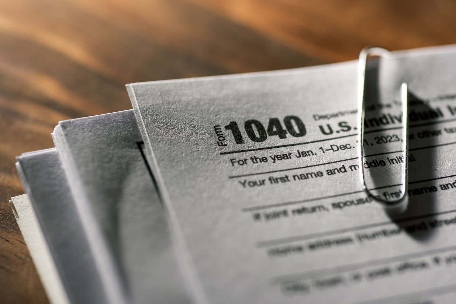 In this photo illustration, a 1040 U.S. Individual Income Tax Return document is seen on a desk on April 15, 2024 in North Haledon, New Jersey.