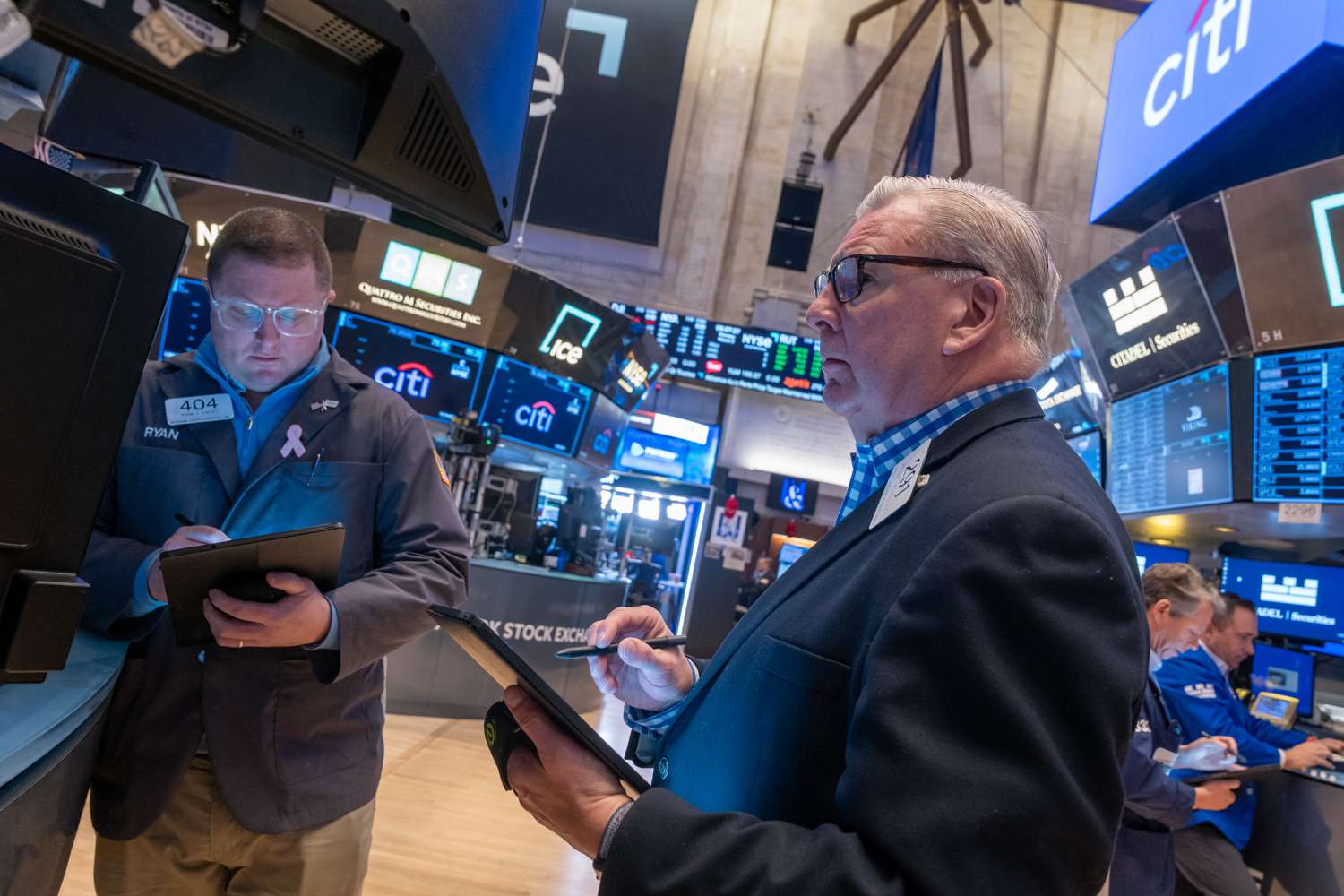 Traders work on the New York Stock Exchange 