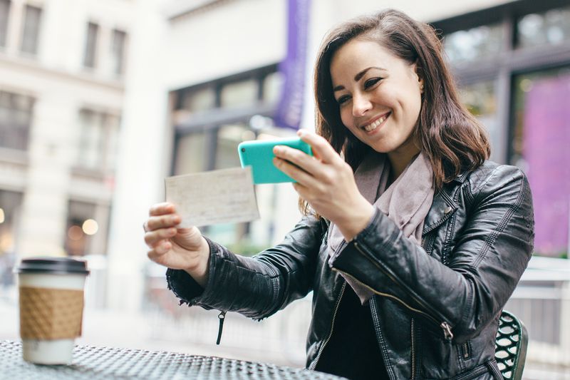 New York Woman Depositing Check Remotely
