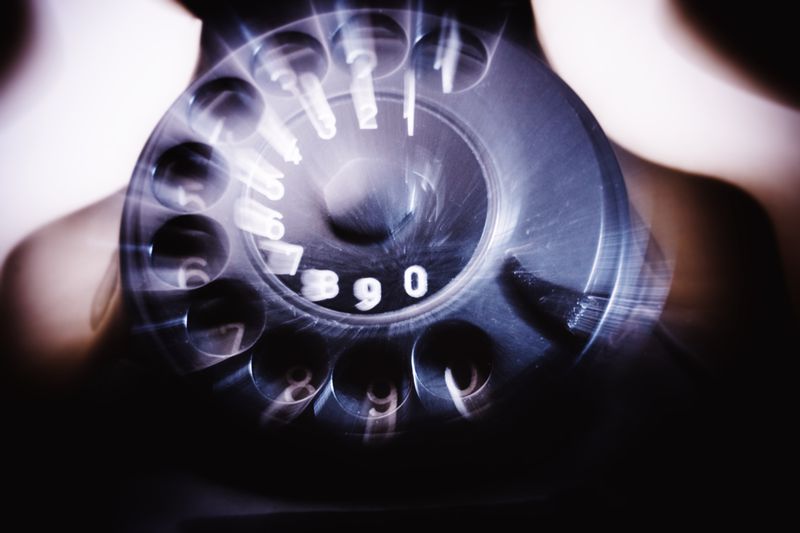 Close-up of old-fashioned rotary-dial telephone
