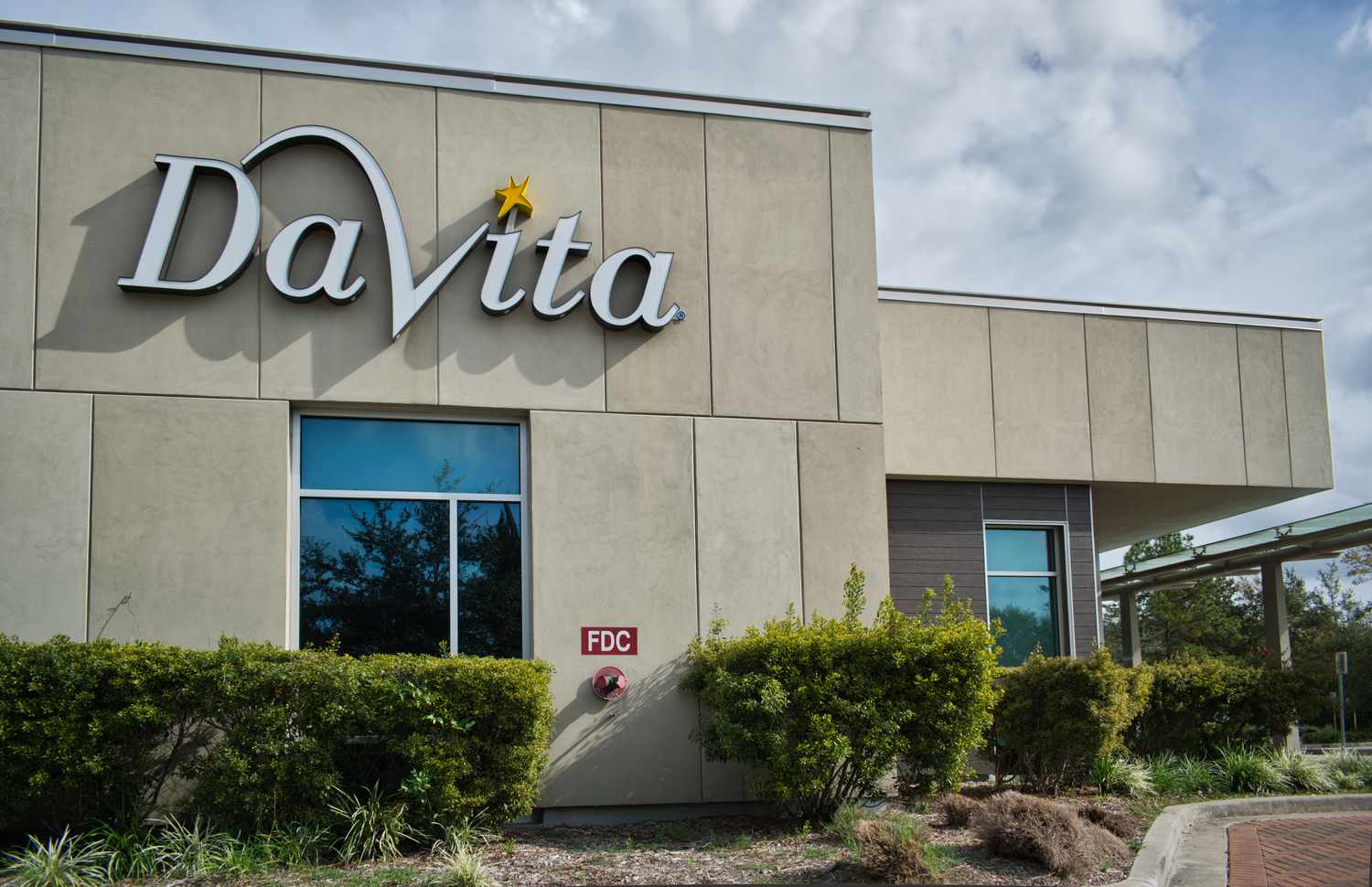 The DaVita logo on the exterior of a building in Houston. 