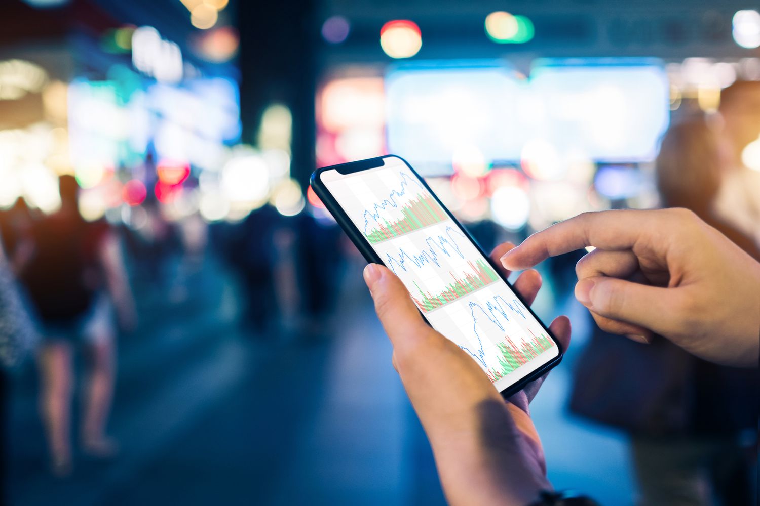 Person checking stocks on a smart phone.