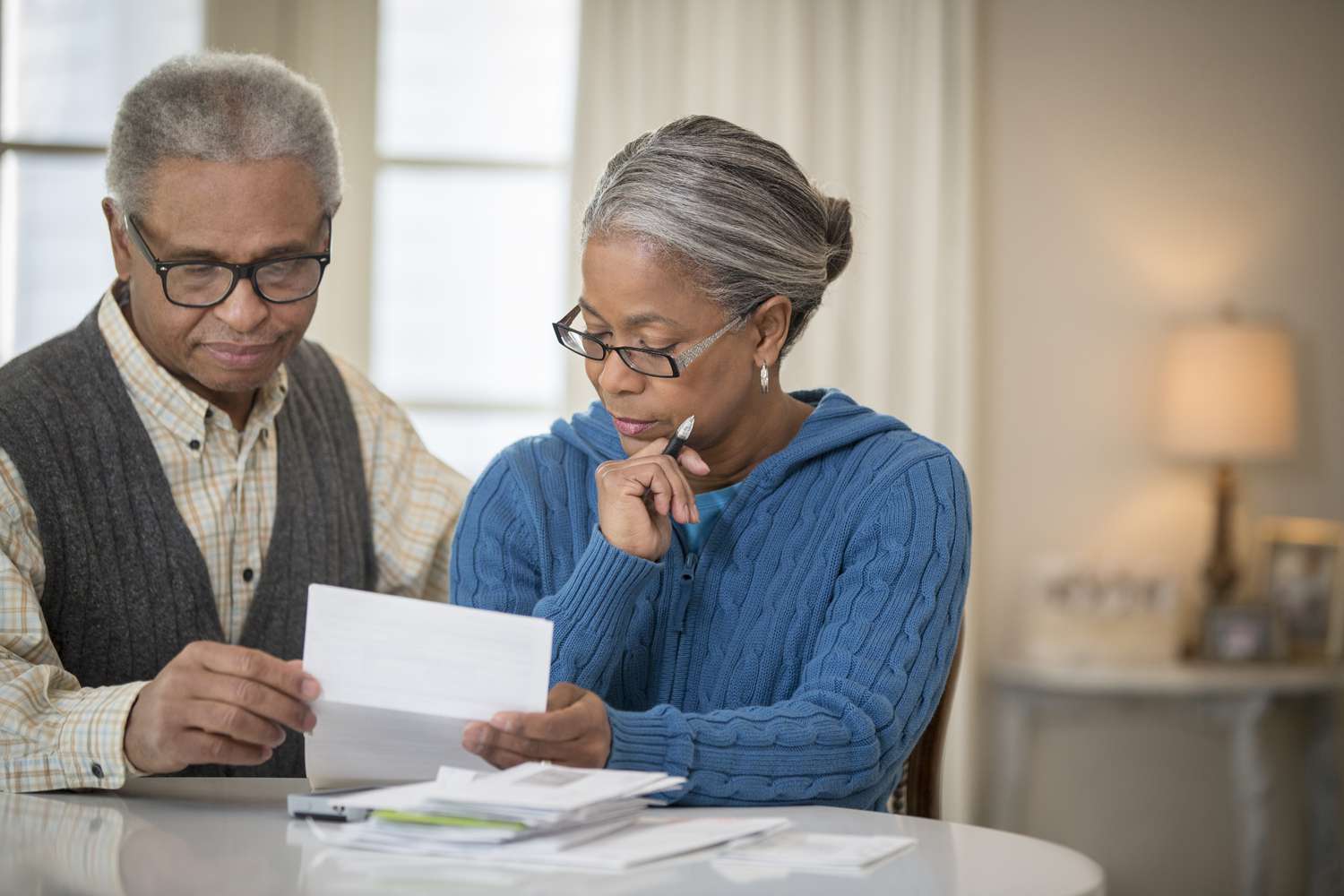Couple looking at bills