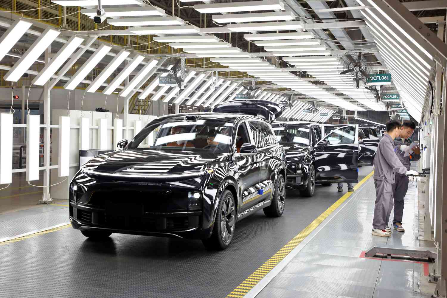 Employees assembling new electric vehicles at Li Auto factor in Changzhou, China