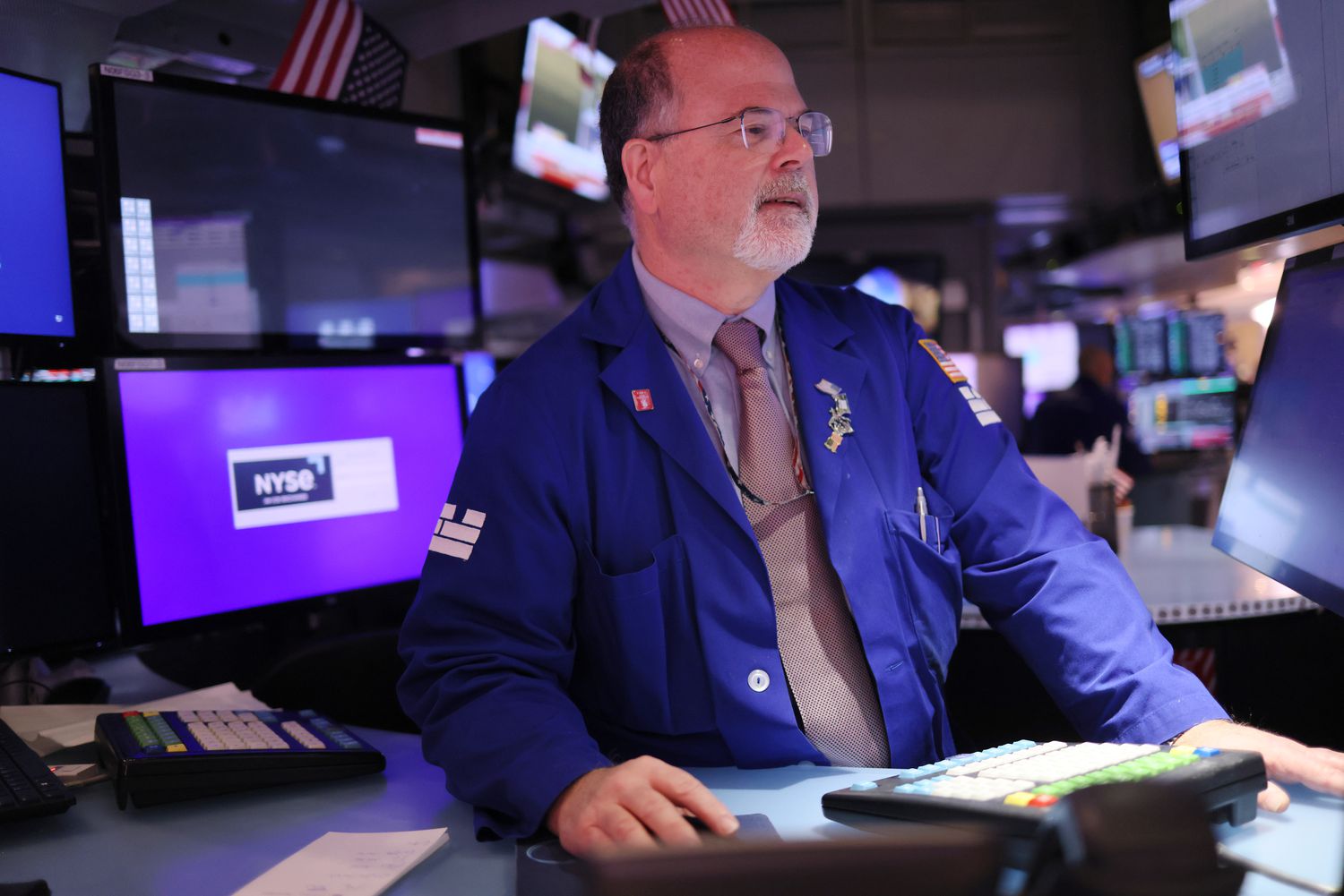 Traders work on the floor of the New York Stock Exchange.