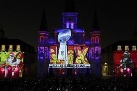 A general view of the Super Bowl LIX logo, the Kansas City Chiefs logo and the Philadelphia Eagles logo are projected onto St. Louis Cathedral at Jackson Square in the French Quarterahead of Super Bowl LIX on February 05, 2025 in New Orleans, Louisiana.