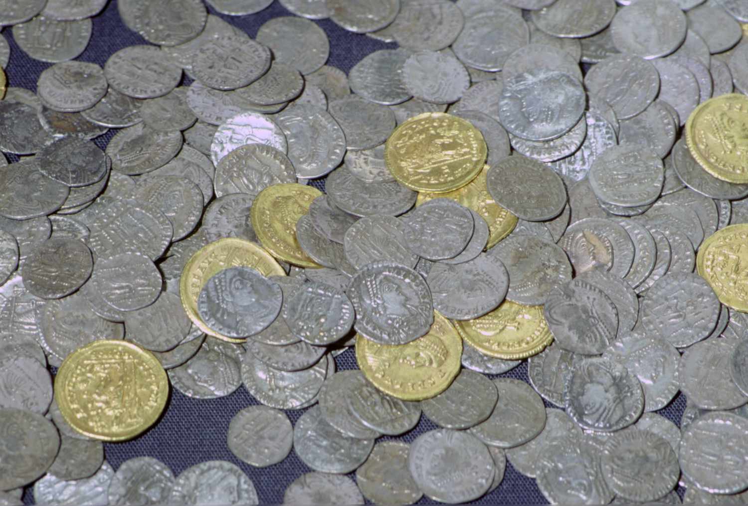 Coins from the Hoxne hoard, Roman Britain, buried in the 5th century. Found in Hoxne, Suffolk in 1992.