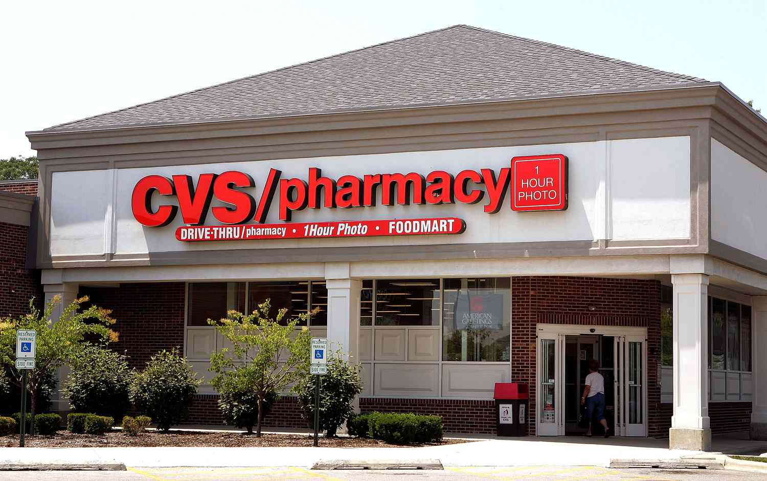 A woman walks into a CVS store June 23, 2005 in Mount Prospect, Illinois.