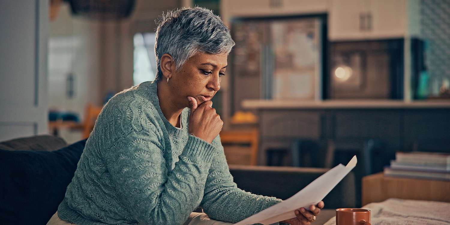 A woman reviewing papers