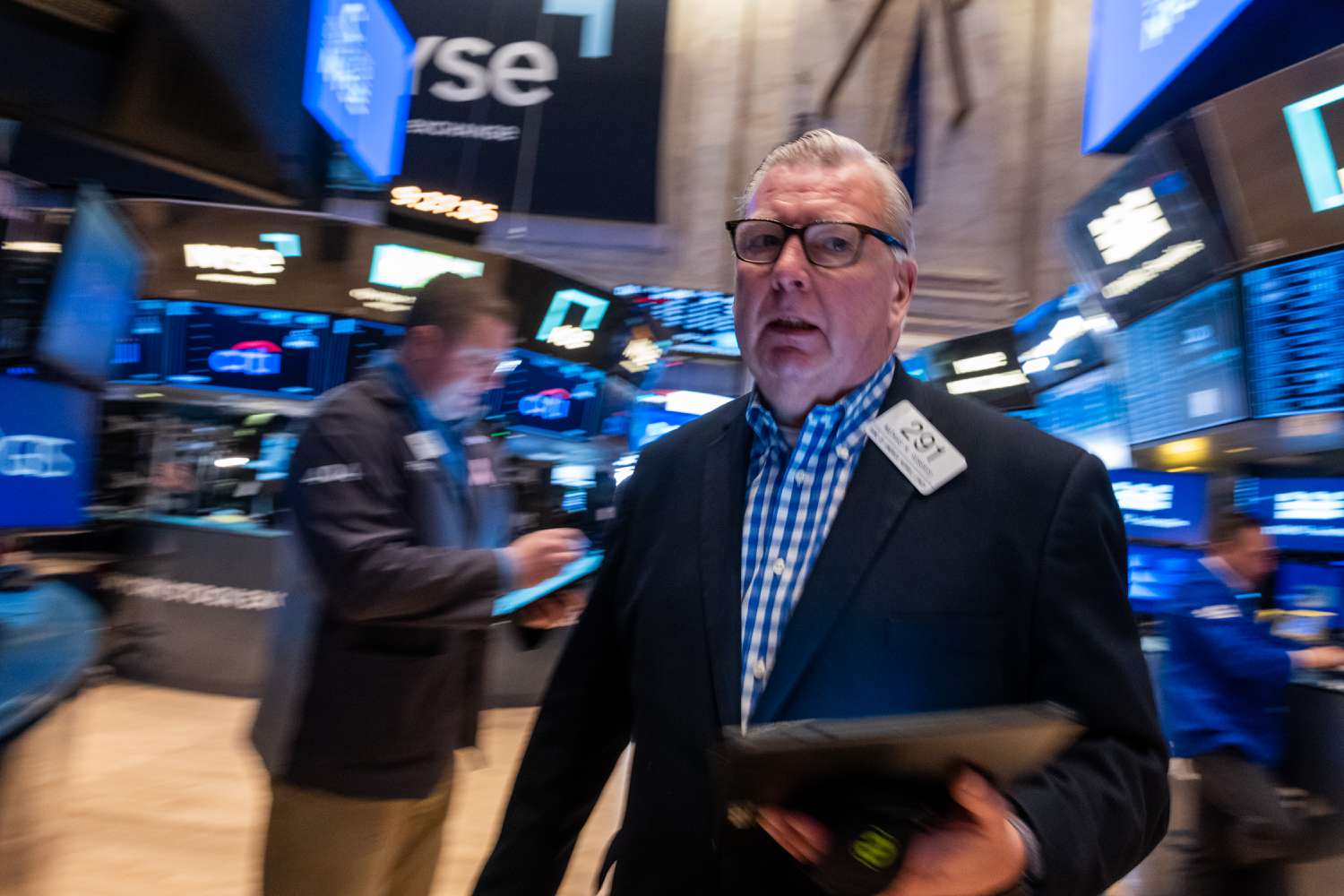 Traders work on the New York Stock Exchange.