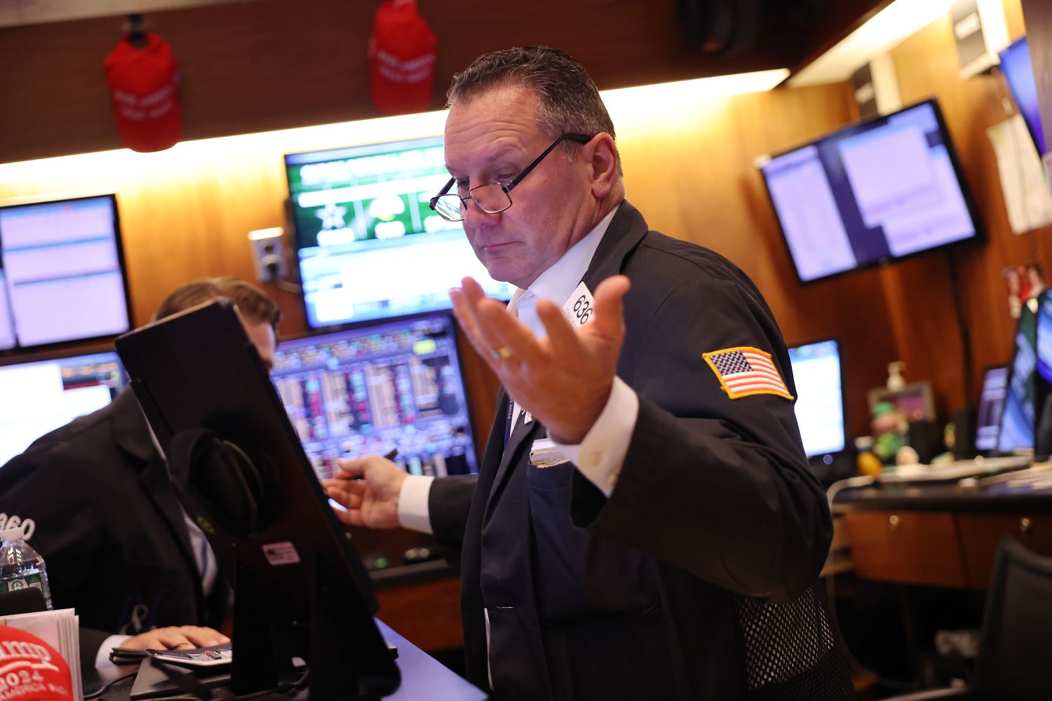 Traders work on the floor of the New York Stock Exchange.