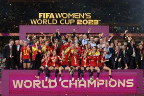 Spain players celebrate with the trophy at the awards ceremony after winning the FIFA Women's World Cup Australia & New Zealand 2023 Final match between Spain and England at Stadium Australia on August 20, 2023 in Sydney