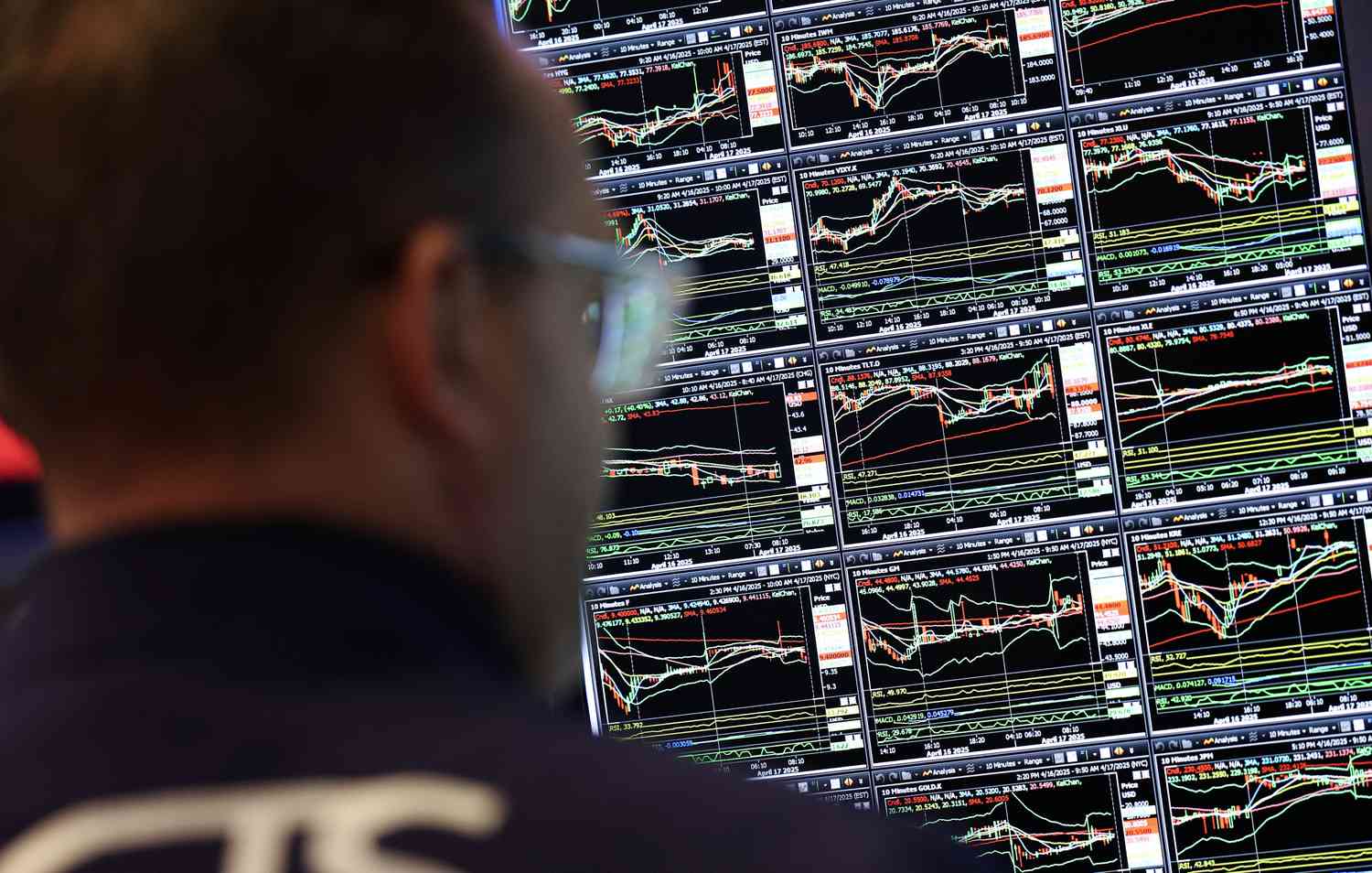 A trader works on the floor of the New York Stock Exchange (NYSE) at the opening bell in New York City, on April 17, 2025. 