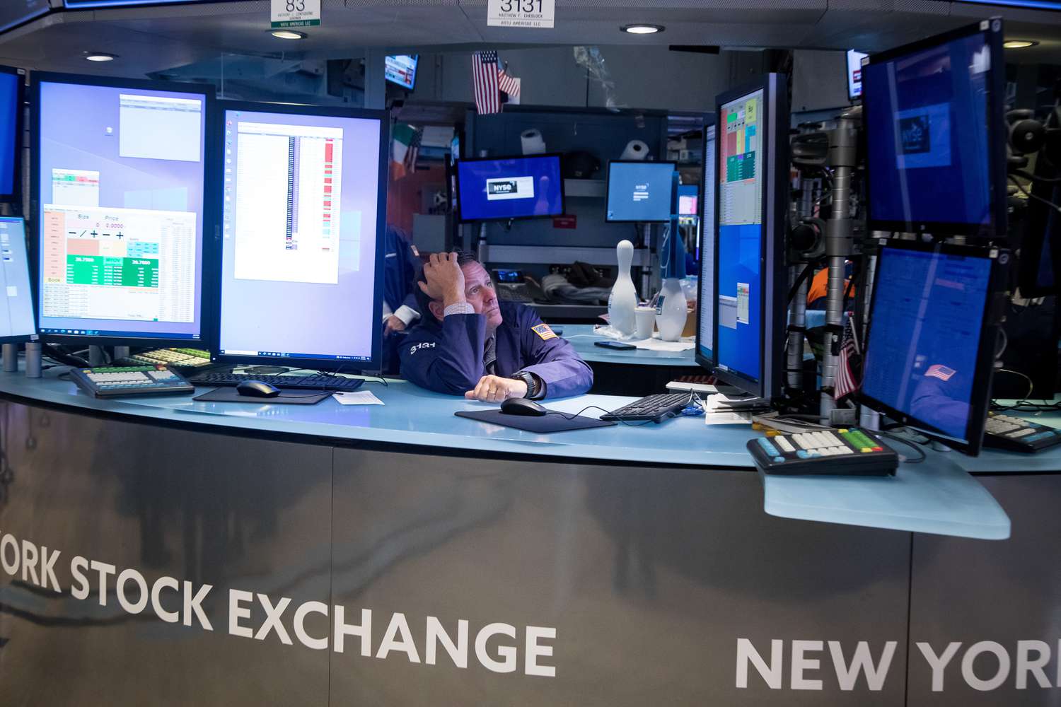 A trader works on the floor of the New York Stock Exchange.