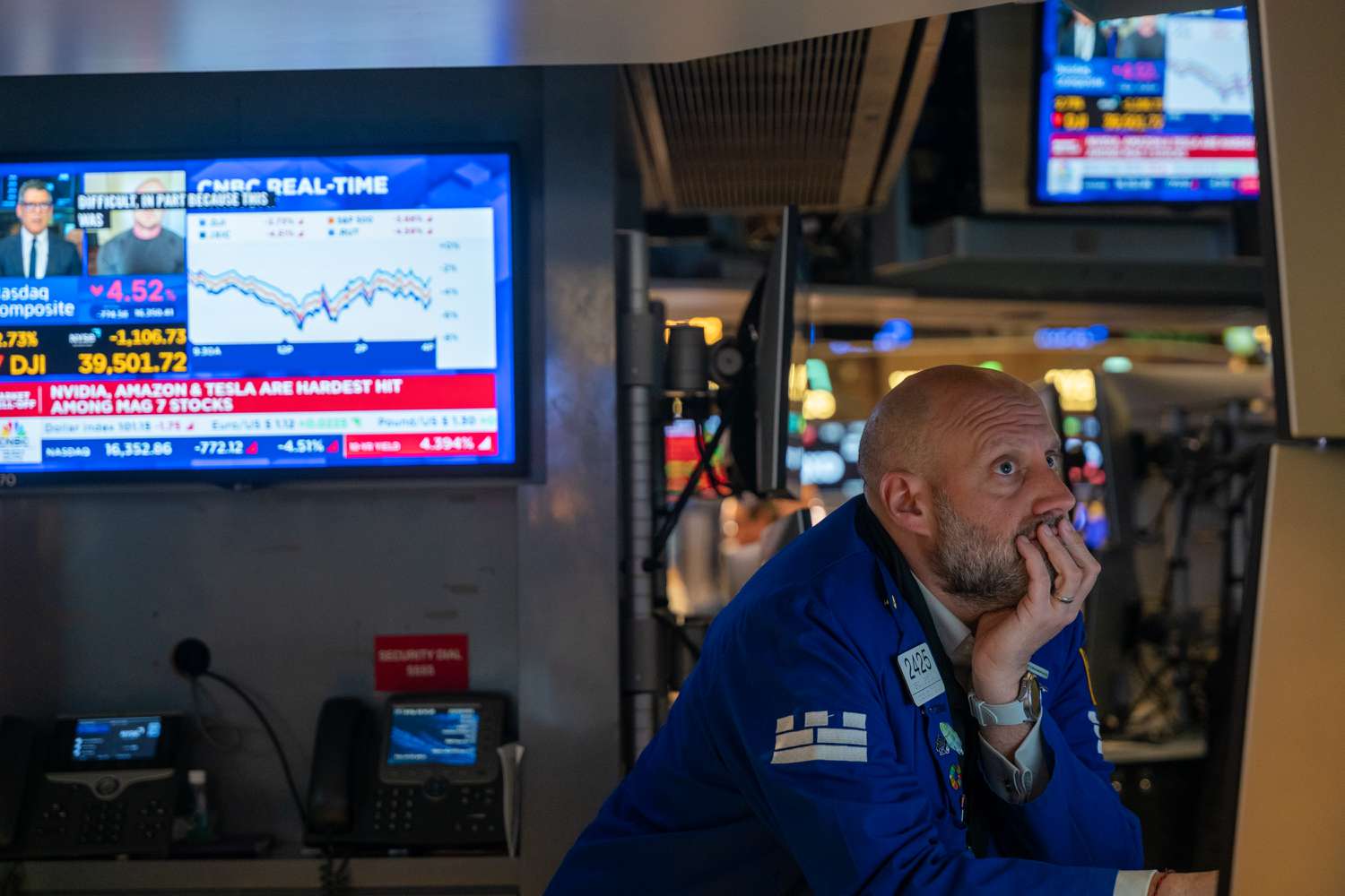 Traders work on the floor of the New York Stock Exchange.