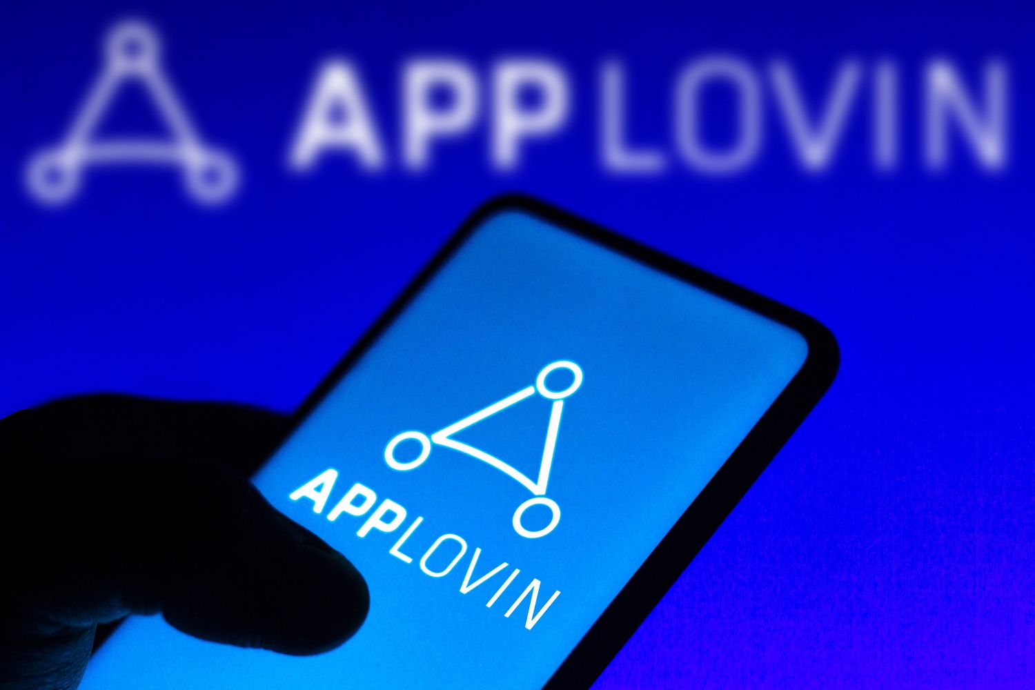 Applovin logo on a smartphone