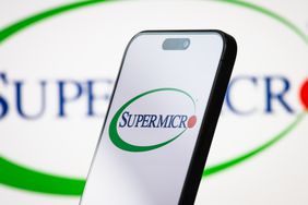 The logo of Super Micro Computer, Inc. (Supermicro) is displayed on a smartphone screen, with the company's branding visible in the background