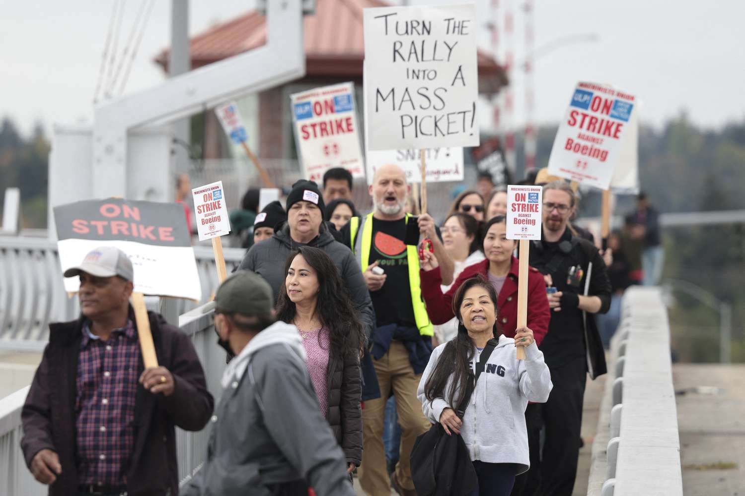 Workers march toward Boeing Field following a strike rally in Seattle, Washington, on Oct. 15, 2024.