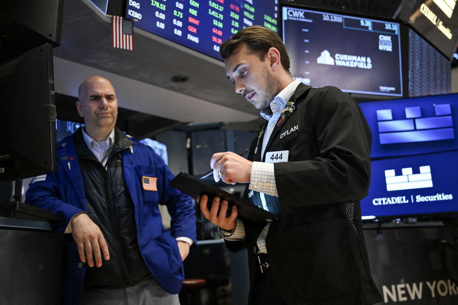 Traders work on the floor of the New York Stock Exchange
