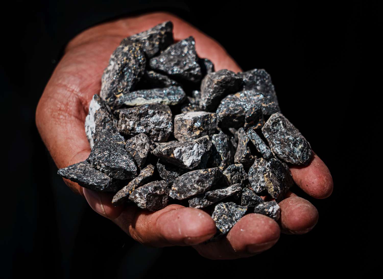 Large rocks containing chromite, is crushed into smaller bitesize chunks, before to goes through a process to refine and extract the ore that yields chromium, a vital component of stainless steel, at the Mughulkhil mine in Logar Province, Afghanistan, Thursday, Sept. 1, 2022. 